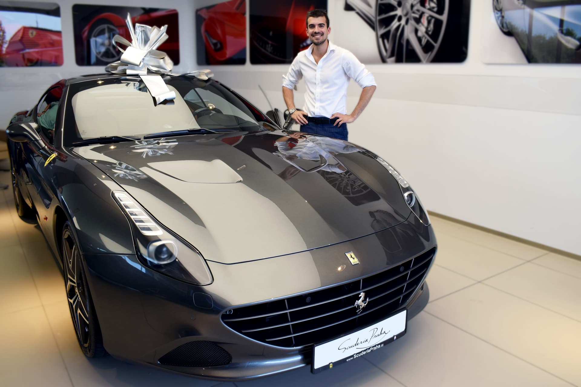 Giulio being given a Ferrari for hitting $300K in a single month